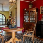 Red Sitting Room Photography by Beau Beauman